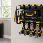 Wall-mounted cordless drill organizer in a clean small garage